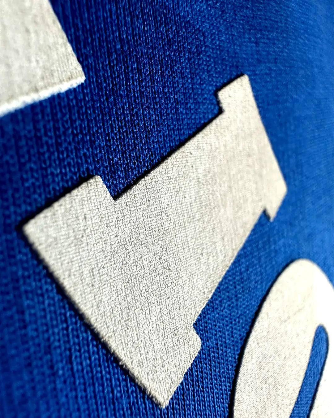 Close-up of a blue and white with branding